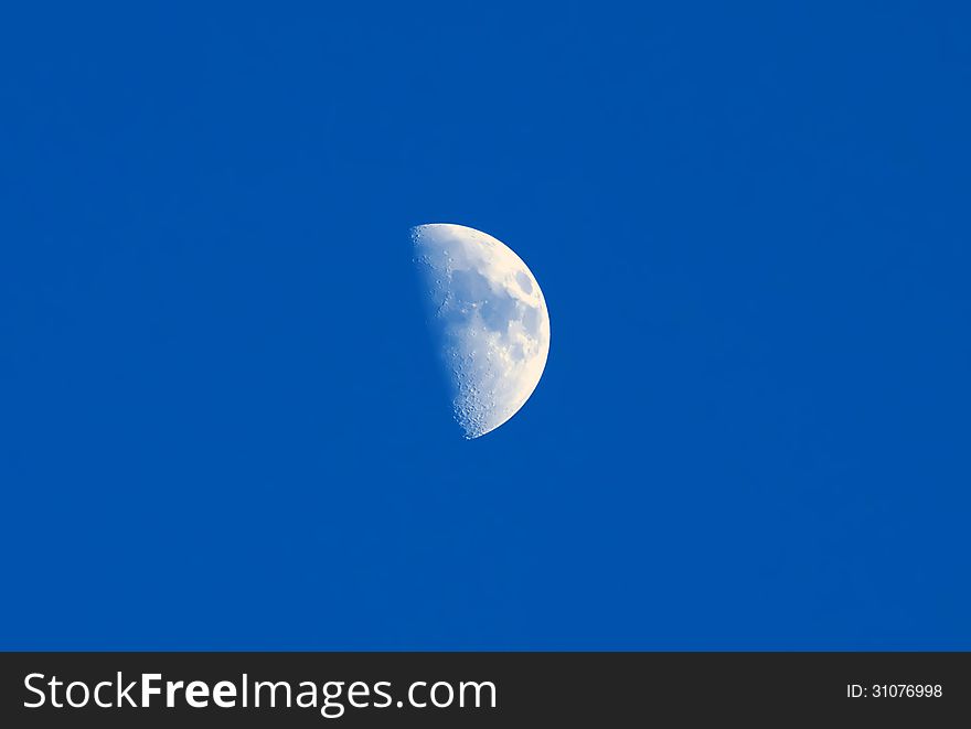 Moon on the blue sky