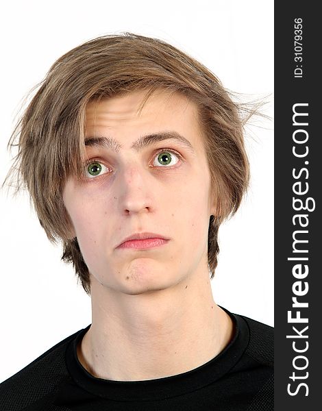 Young caucasian man frustrated with something, on white background. Young caucasian man frustrated with something, on white background