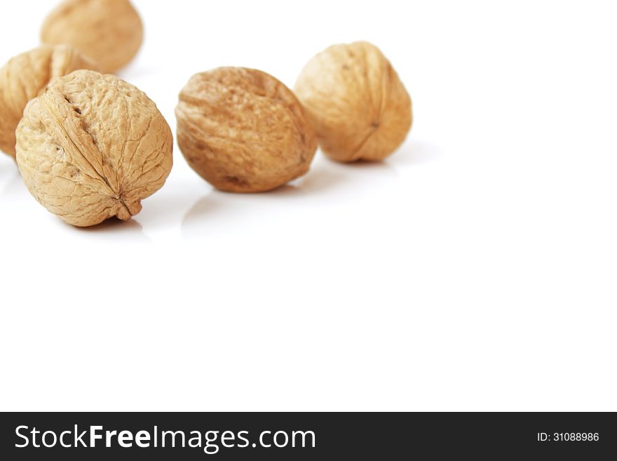 Walnuts On A White Background