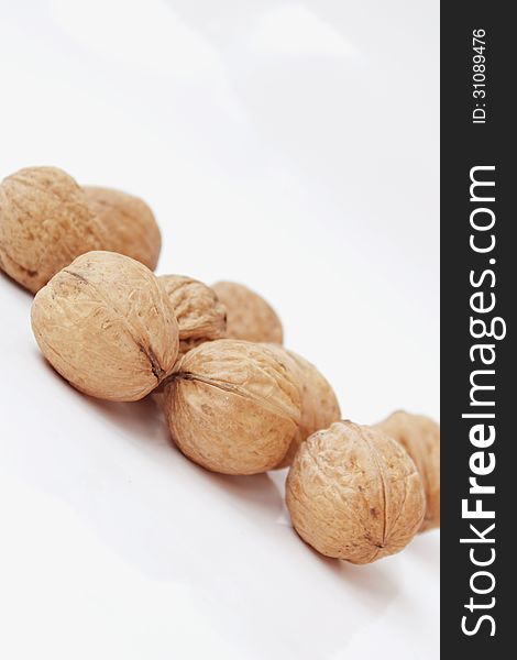 Walnuts On A White Background