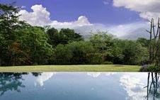 Cloud Reflections On The Infinity Pool With Beautiful Landscape Royalty Free Stock Photos