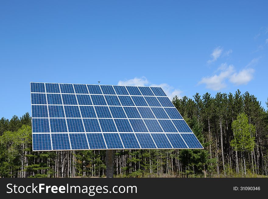 Solar panels under blue sky. Solar panels under blue sky