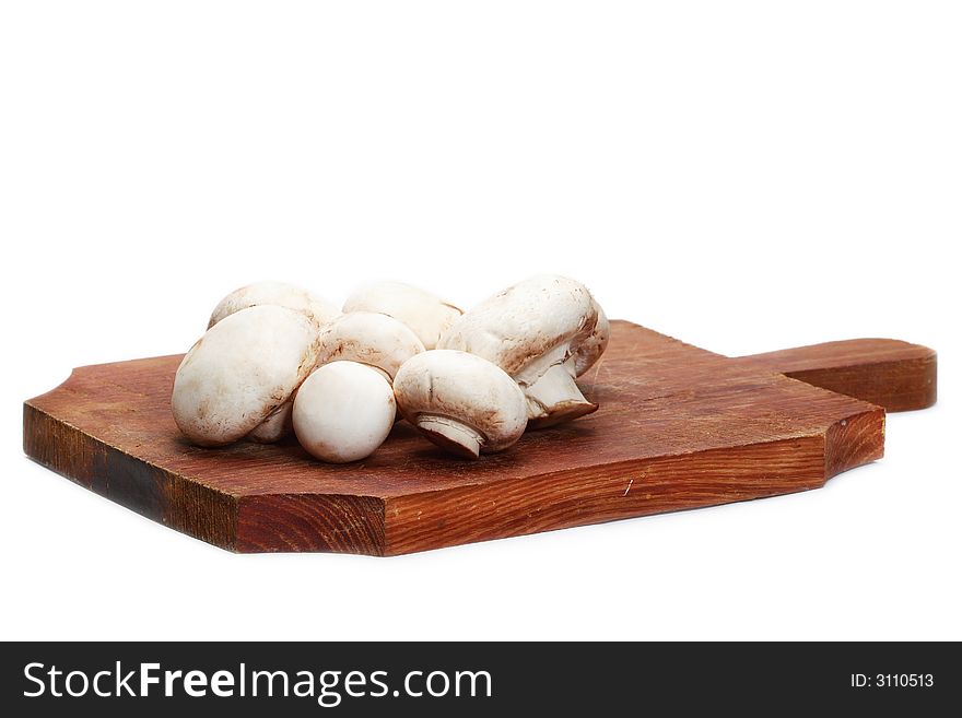 Close up of button mushrooms isolated on white background