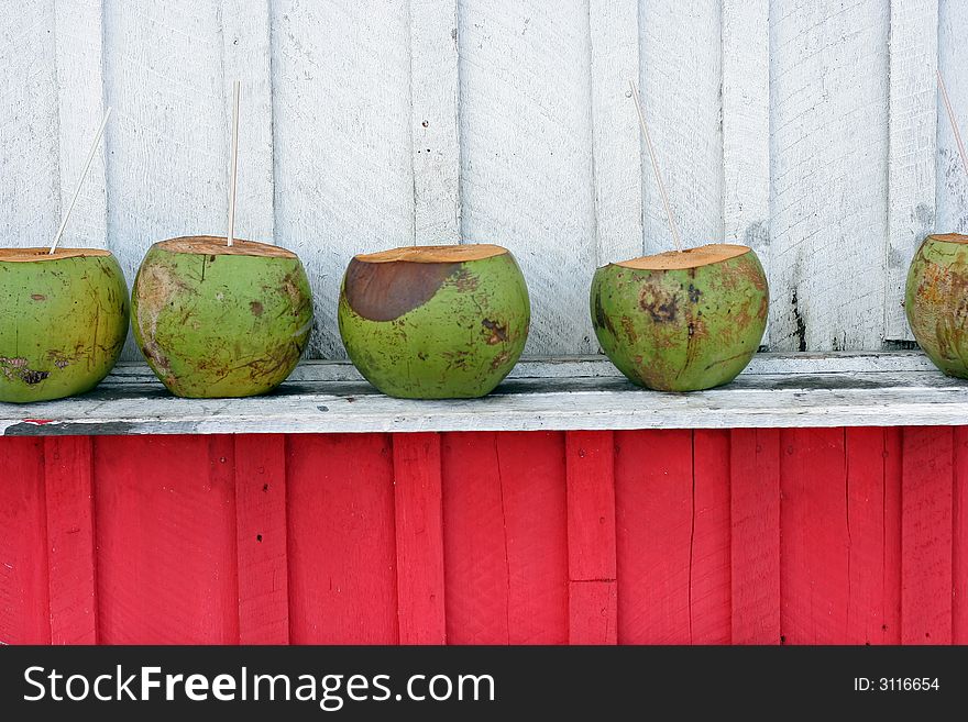 Wooden red tent for commerce of coconuts. Wooden red tent for commerce of coconuts