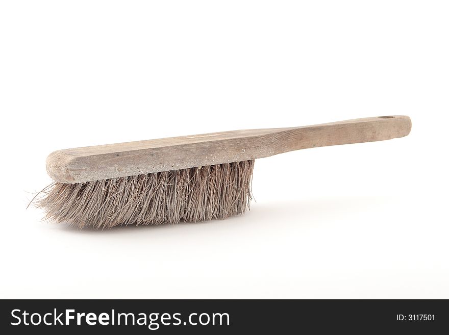 Dirty sweep with a wooden handle