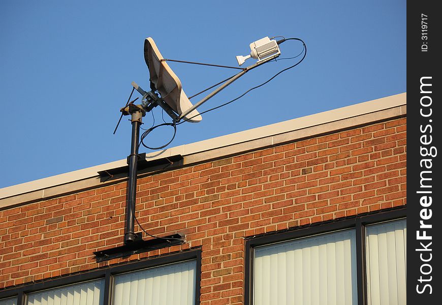 Photo of small satellite dish for a business. Photo of small satellite dish for a business.