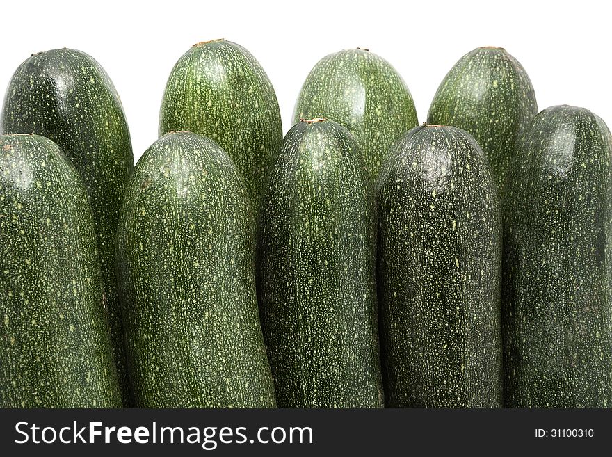 Fresh ripe courgettes isolated on white background