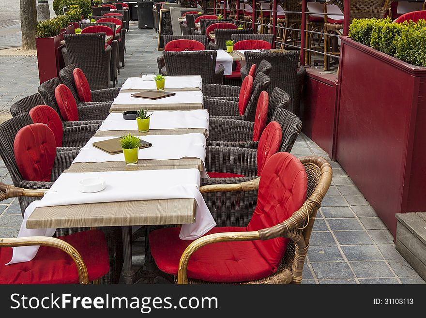 Tables in outdoor restaurant - old town of Brugge, Belgium. Tables in outdoor restaurant - old town of Brugge, Belgium.