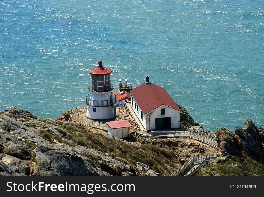 The light house of Point Reyes at the Northern California Shoreline .