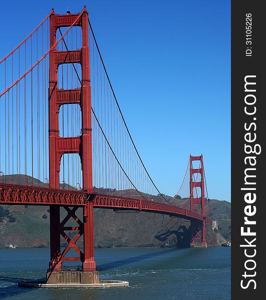 The Golden Gate Bridge is a suspension bridge spanning the Golden Gate, the opening of the San Francisco Bay into the Pacific Ocean. As part of U.S. Route 101 and California State Route 1, the structure links the city of San Francisco to Marin County. It is one of the most internationally recognized symbols of San Francisco.