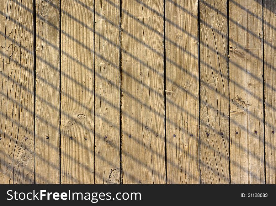 Old weathered planks with nails straight and skew shadow. Old weathered planks with nails straight and skew shadow