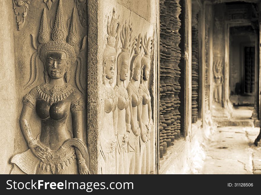 Ornate bas-reliefs of Apsara on the inner wall of Angkor Wat, Cambodia. Ornate bas-reliefs of Apsara on the inner wall of Angkor Wat, Cambodia