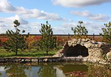 Garden With A Pond And A Grotto Stock Photos Garden With A Pond And A Grotto Stock Photos