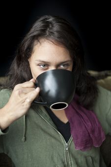 Young Woman With Beautiful Green Eyes Drinking Coffee Stock Images Young Woman With Beautiful Green Eyes Drinking Coffee Stock Images