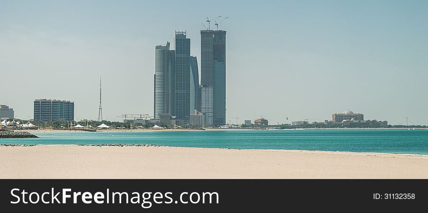 Abu Dhabi skyline viewed from the corniche beach.
