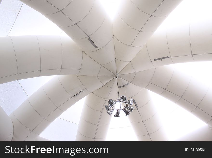 Chandelier hanging from a ceiling inflatable.