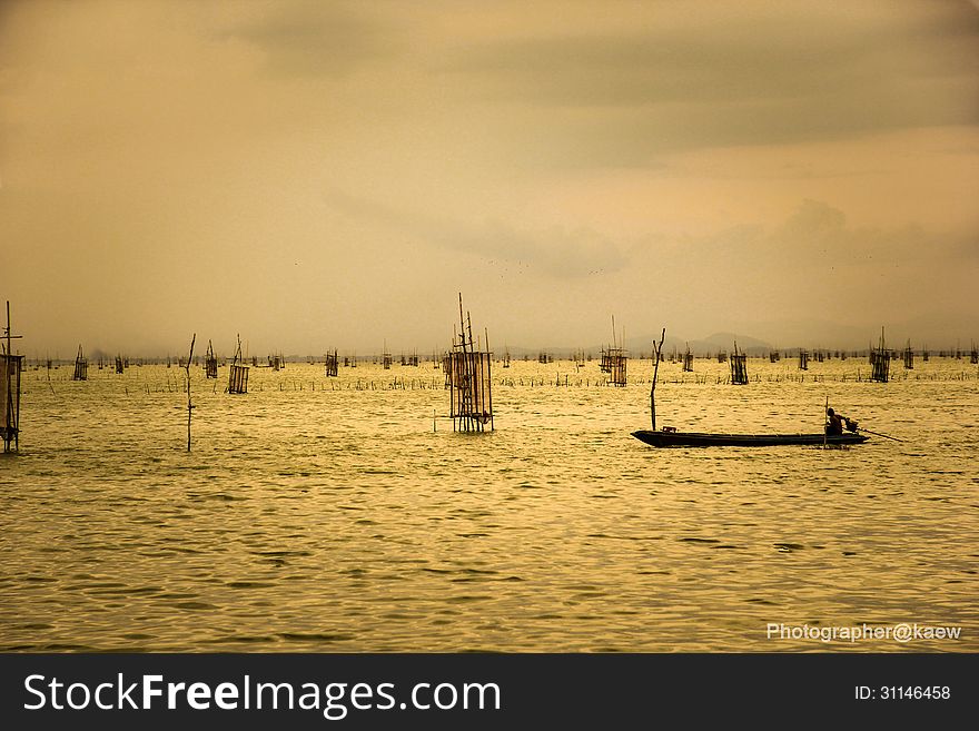 Lagoon In Thailand. Koh Yor, Songkhla. Professional people with fisherman. A beautiful sky.