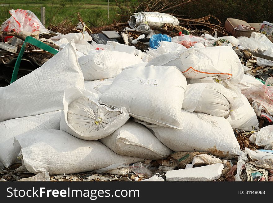 Pile of industrial garbage bags at rural