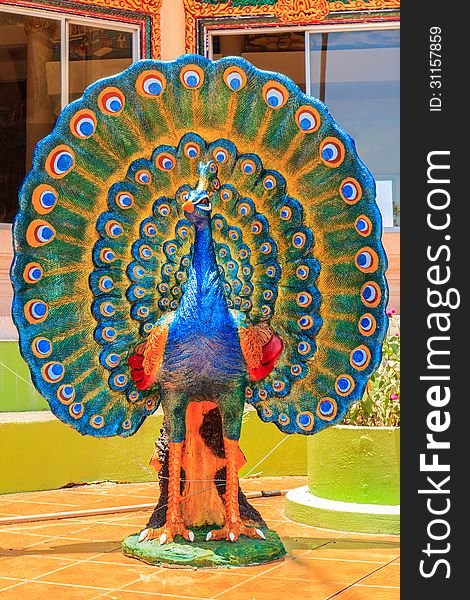 Beautiful colorful peacock statue in Thailand. Beautiful colorful peacock statue in Thailand.