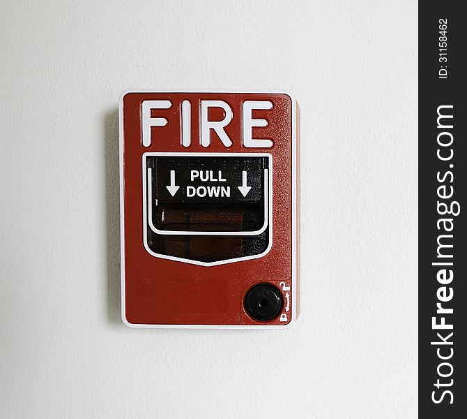 Fire alarm switch on wall