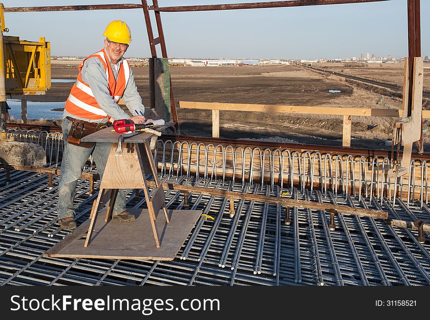 Worker at bridge construction site. Worker at bridge construction site