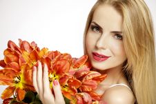 Beautiful Blonde Girl With The Bouquet Of Tulips Isolated On A W Royalty Free Stock Photography Beautiful Blonde Girl With The Bouquet Of Tulips Isolated On A W Royalty Free Stock Photography