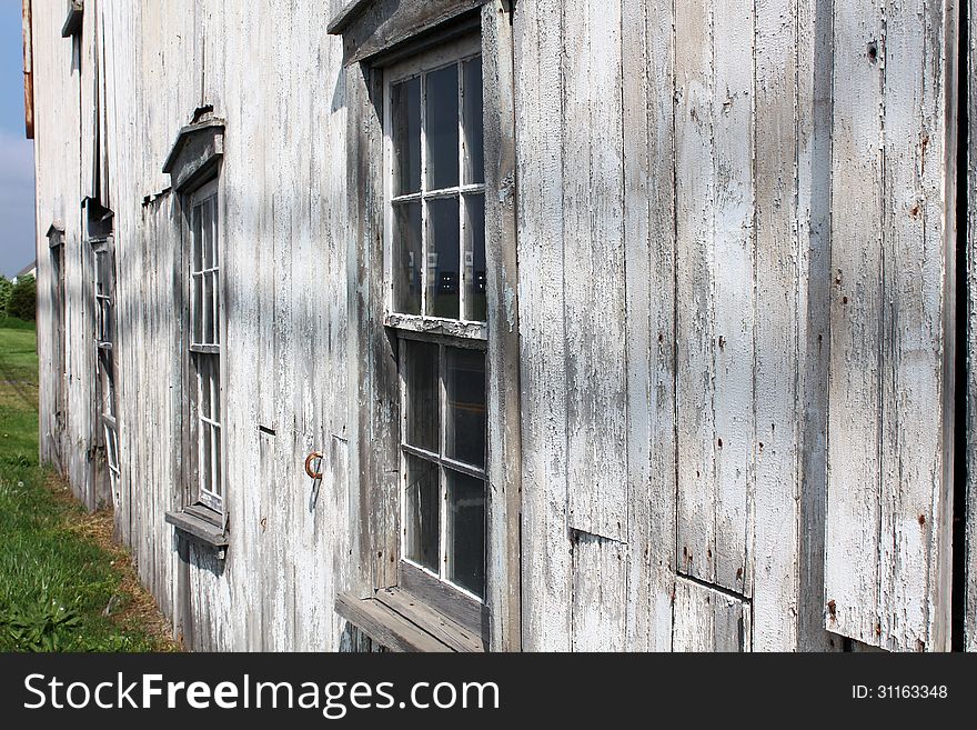 Side View Of Old Weathered Gray Barn