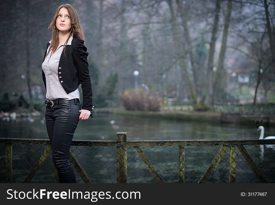 Young woman standing and posing. Young woman standing and posing