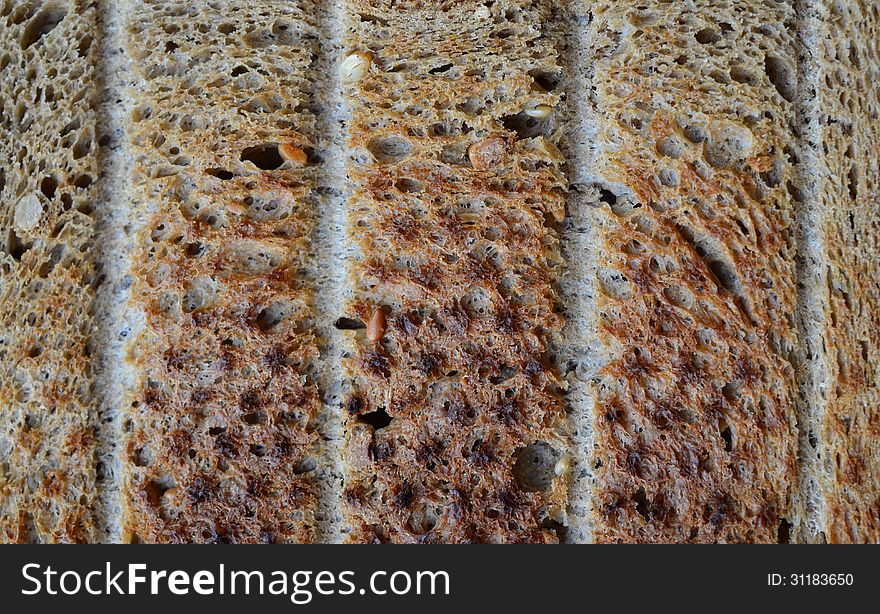 Abstract background - close up of roasted integral toast with seeds. Abstract background - close up of roasted integral toast with seeds