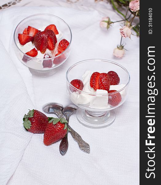 Strawberry dessert with ice cream in a sundae dish