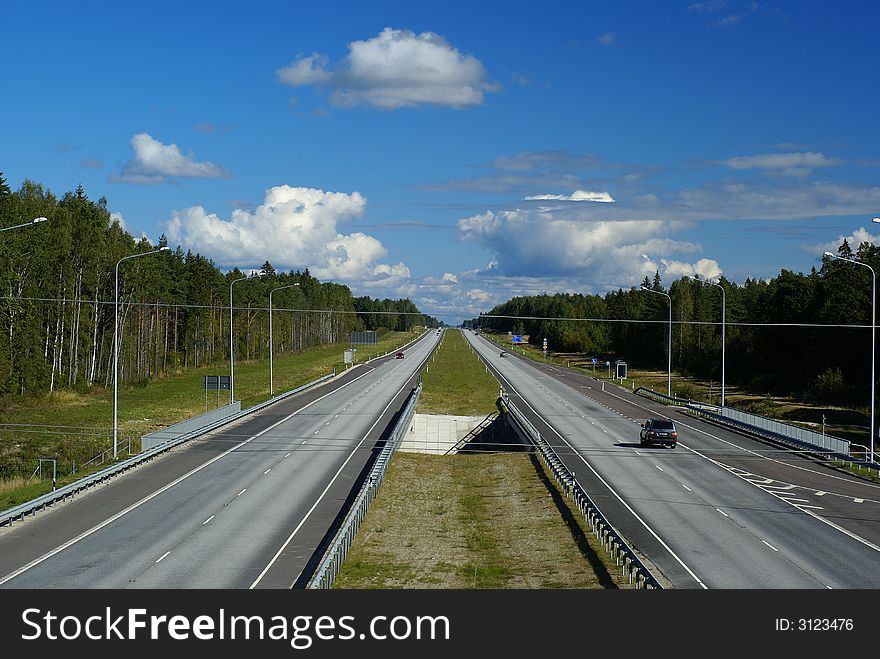 Two directions of asphalt in the srteet.