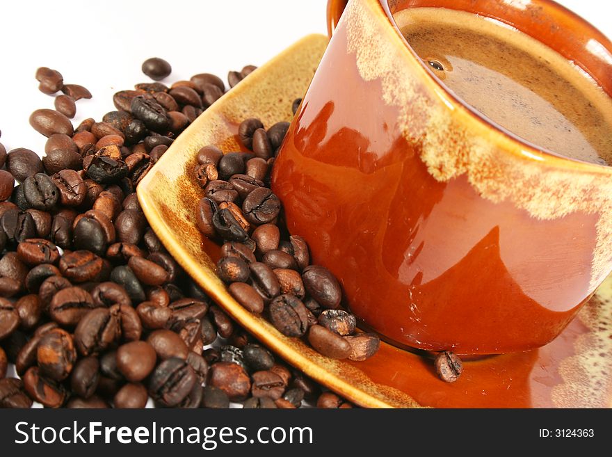 Cup of coffee with coffee beans aroma background