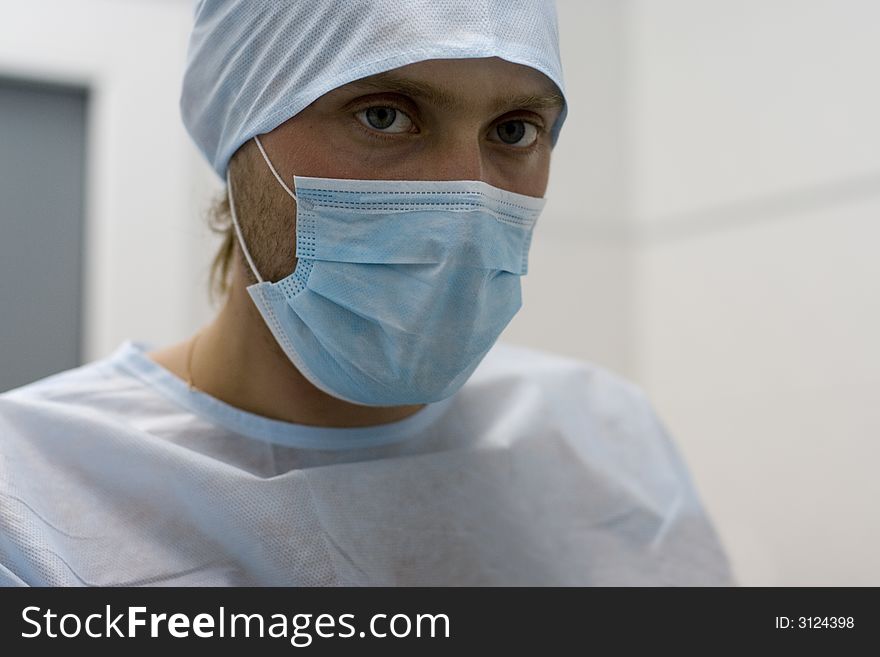 Portrait of the doctor with a bandage on the person. Portrait of the doctor with a bandage on the person