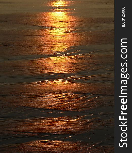 Patterns on a beach at sunset. Patterns on a beach at sunset