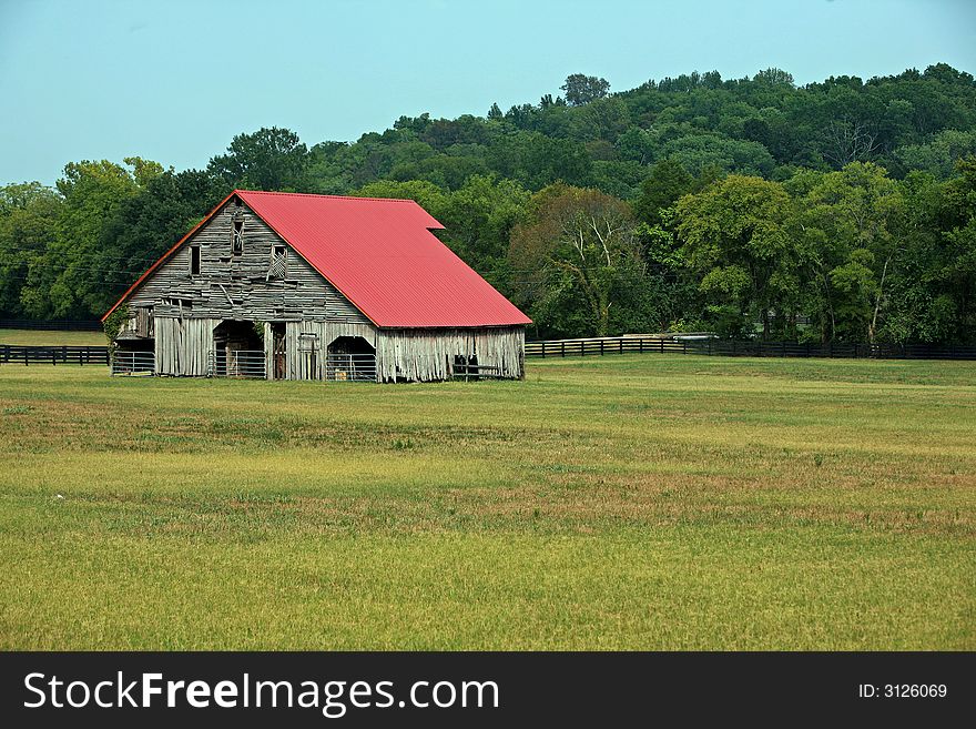 Barely standing yet standing proudly this rural barn looks over its field in rural Nashville. Barely standing yet standing proudly this rural barn looks over its field in rural Nashville