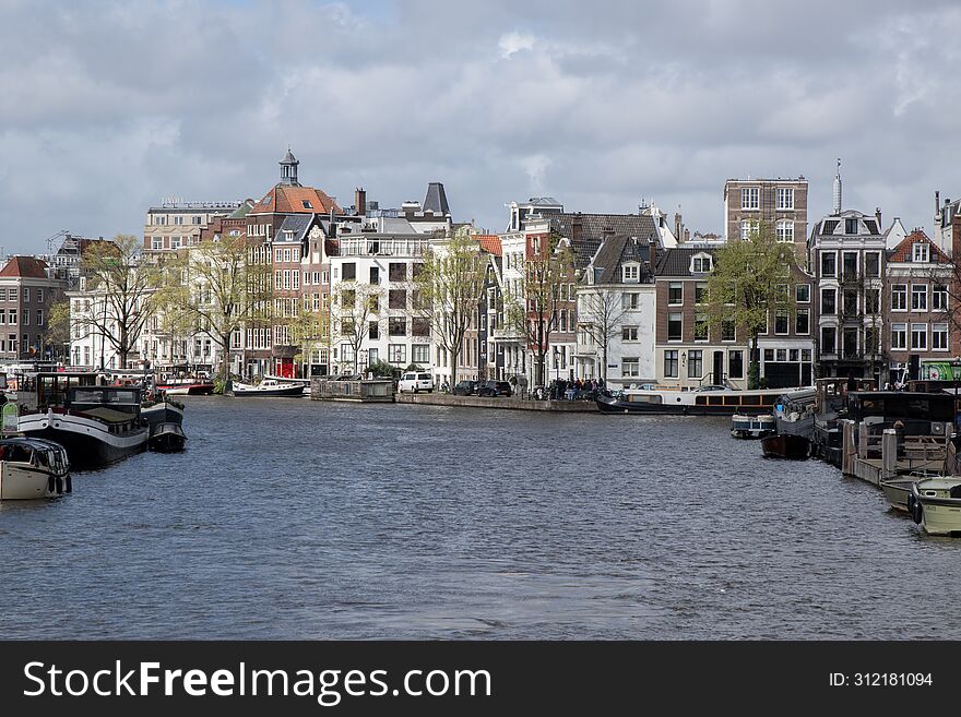 View From The Blauwbrug Bridge At Amsterdam The Netherlands 23-3-2024