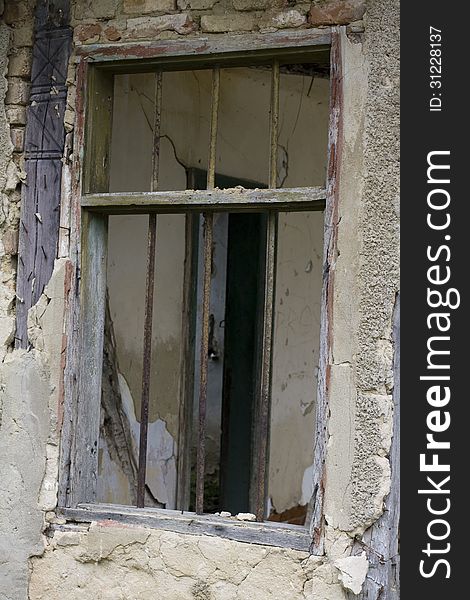 Window of a run-down house. Window of a run-down house