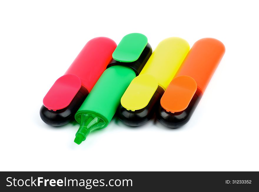 Red, Green, Yellow and Orange Fluorescent Highlighter Pens isolated on white background