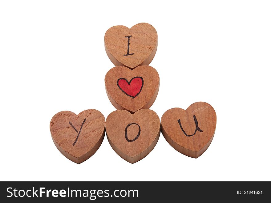 Wooden heart shape blocks with I love you text.