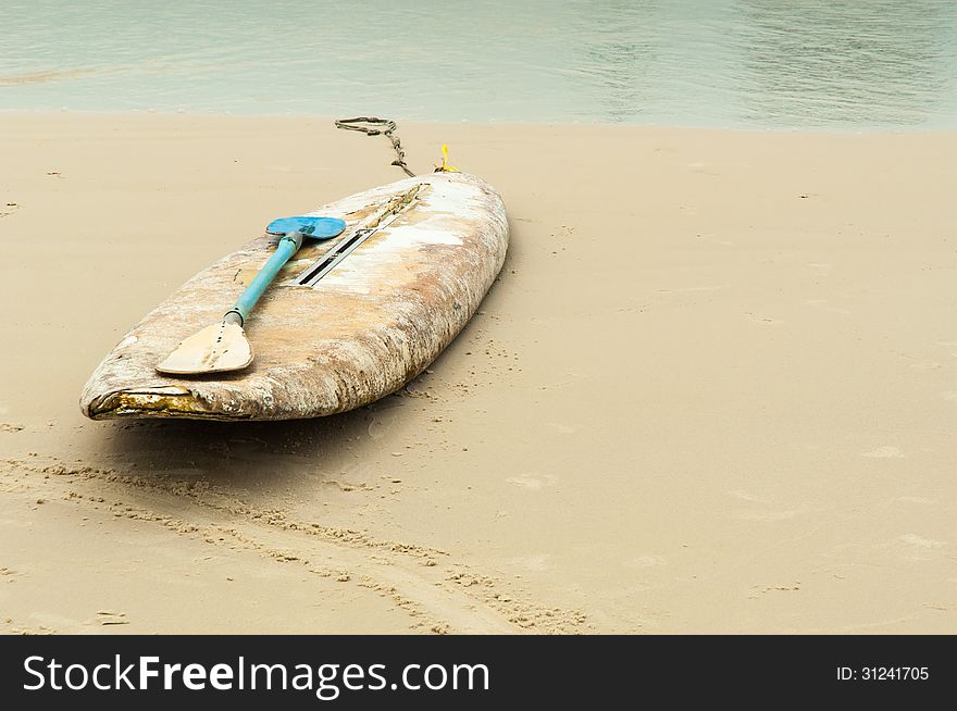 Plastic oar on foam Surfboard