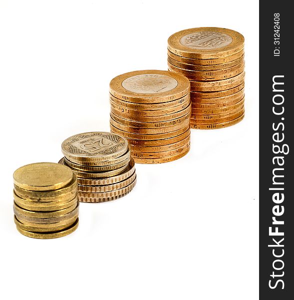 Four stacks of Turkish coins on white background. Four stacks of Turkish coins on white background