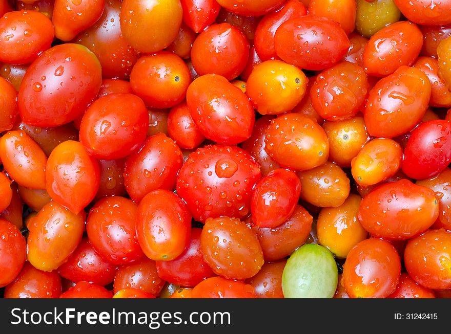 Closeup of fresh tomatos background