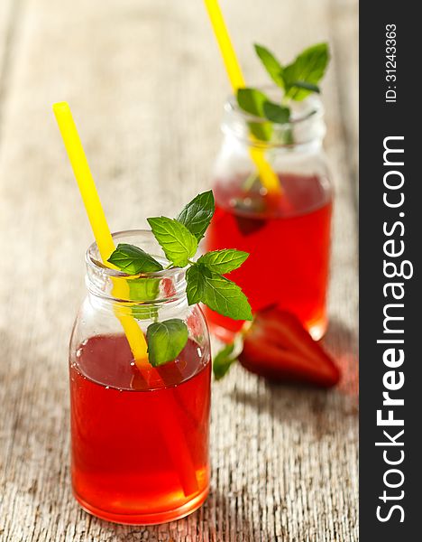 Fresh strawberry drink on wood background. Fresh strawberry drink on wood background