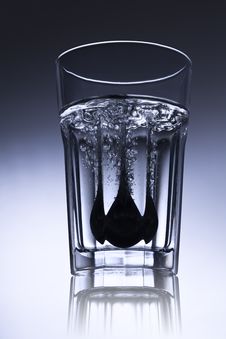 Simple Water-glass With Spoon And Bubbles Stock Photos Simple Water-glass With Spoon And Bubbles Stock Photos