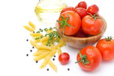 Fresh Tomatoes, Pasta Penne, Olive Oil And Spices On A White Stock Image Fresh Tomatoes, Pasta Penne, Olive Oil And Spices On A White Stock Image