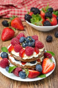 Pancakes With Whipped Cream And Fresh Berries Stock Photography