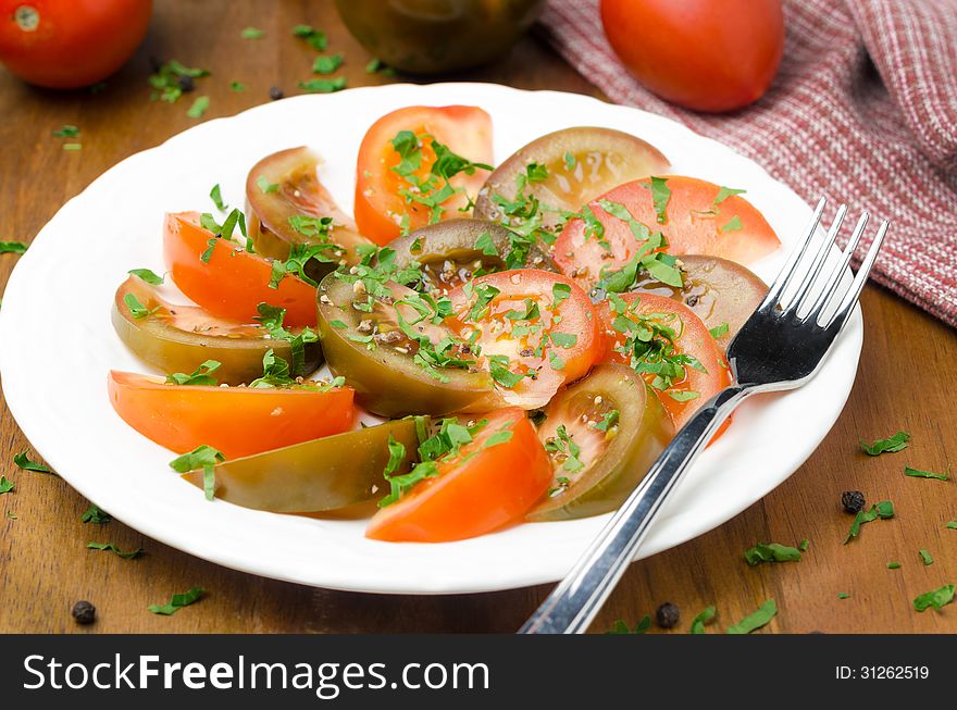 Salad Of Two Varieties Of Tomatoes With Fresh Parsley Horizontal