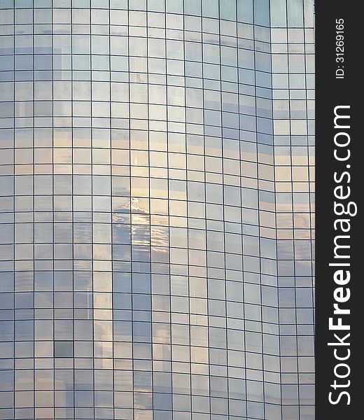 Reflection image of sky on glass surface building. Reflection image of sky on glass surface building