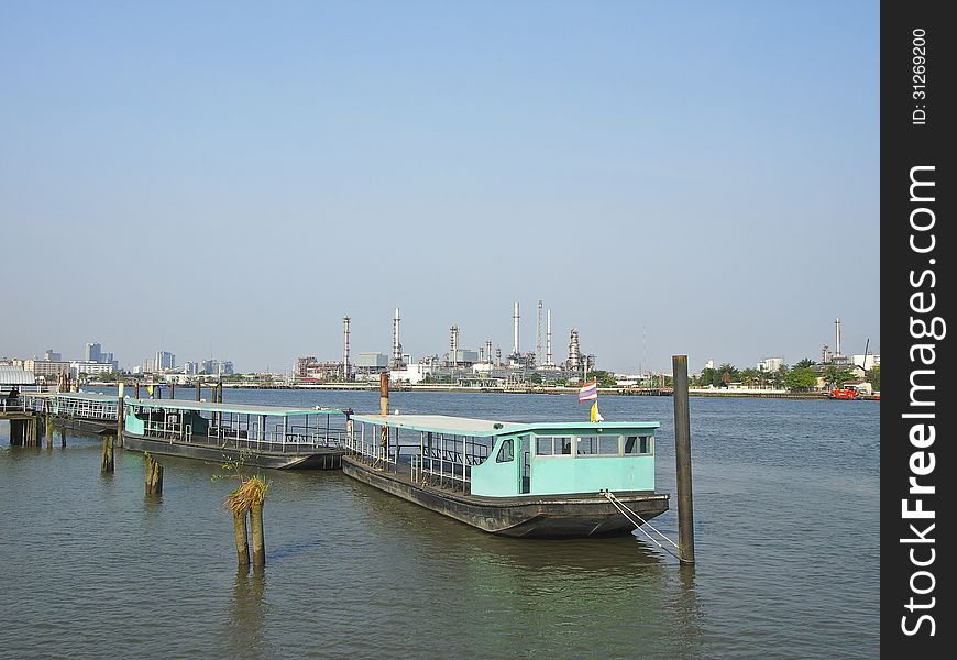 Blue small ferry port for cross Chao Phraya river in sunny day. Blue small ferry port for cross Chao Phraya river in sunny day