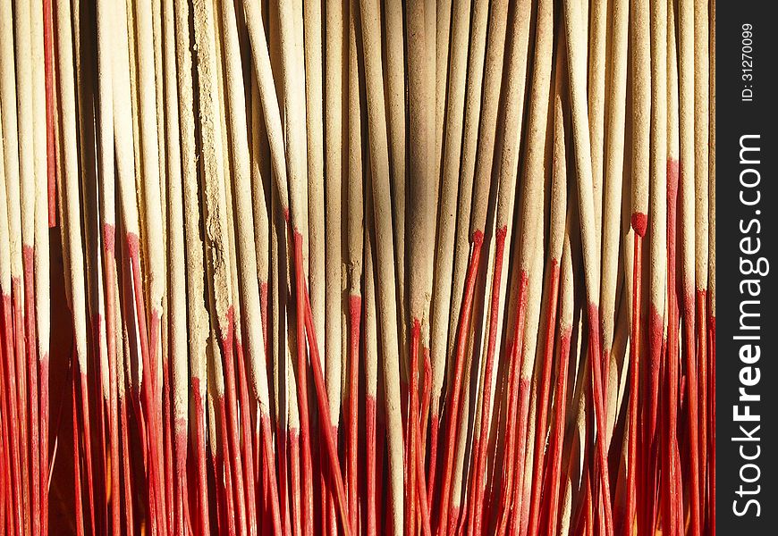 Pattern of pile incense and red stick in sunlight. Pattern of pile incense and red stick in sunlight